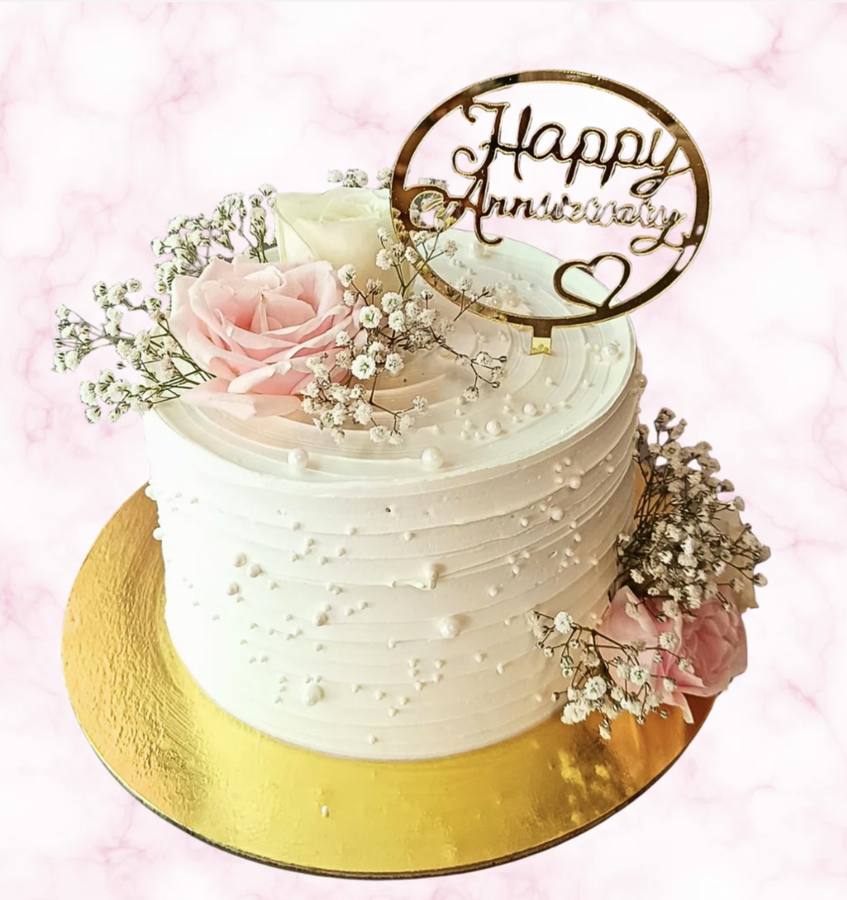 White anniversary cake with pink roses and gold topper — Cake Letter Auckland
